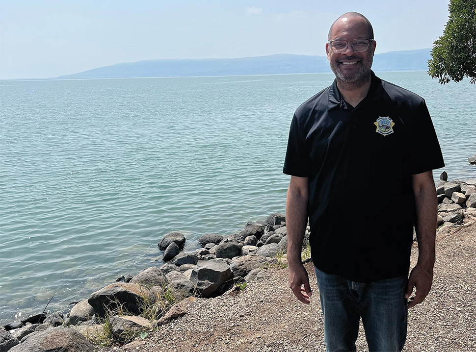Nevada Attorney General Aaron Ford smiling at the shore